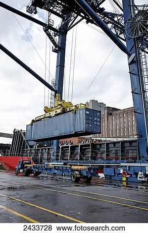 Loading freight at Bickerdike Pier in Old Montreal; Montreal, Quebec, Canada View Large Photo Image Stock Photo - Loading freight at Bickerdike Pier in Old Montreal; Montreal, Quebec, Canada. Fotosearch
