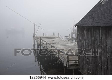 Lobster boat dock in fog; New Harbor, Maine, United States of America View Large Photo Image Picture - Lobster boat dock in fog; New Harbor, Maine, United States of America. Fotosearch