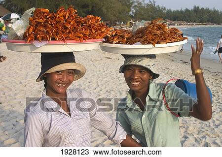 Stock Image - Lobster Girls, Occheuteal Beach. Fotosearch