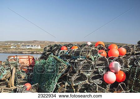 Lobster pots; Portmagee, Iveragh Peninsula, County Kerry, Ireland, UK View Large Photo Image Picture - Lobster pots; Portmagee, Iveragh Peninsula, County Kerry, Ireland, UK. Fotosearch