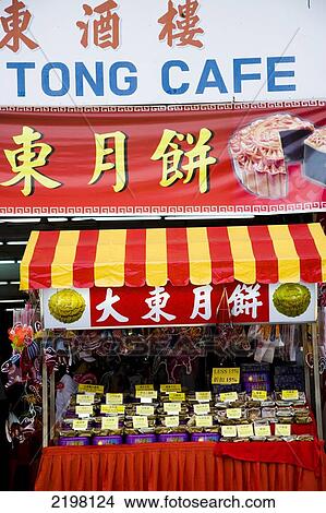 Picture - Local Chinese Cafe Selling Cakes, Large Chinese Banners Above The Shop Front. Georgetown, Pulau Pinang (Penang), Malaysia, South East Asia.. Fotosearch