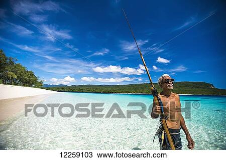 Stock Image - Local fisherman at Jaco Island; Timor-Leste. Fotosearch