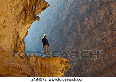 Local Guide Enjoying The View In Wadi Rum (The Valley Of The Moon), Jordan, Middle East View Large Photo Image Stock Photo - Local Guide Enjoying The View In Wadi Rum (The Valley Of The Moon), Jordan, Middle East. Fotosearch