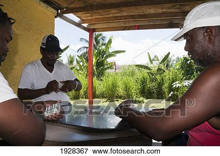 Stock Photo - Local Men Playing Dominoes. Fotosearch