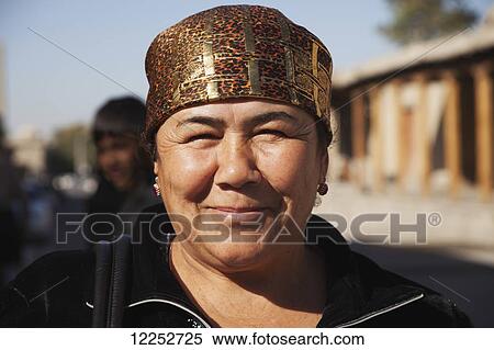 Stock Photography - Local woman in market, Bukhara Old Town; Uzbekistan. Fotosearch
