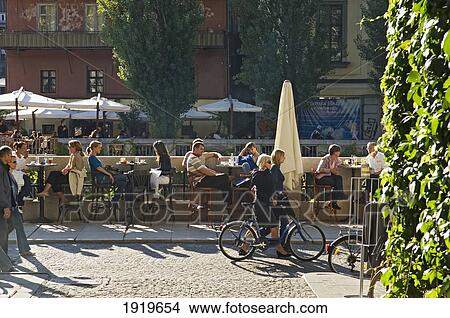 Picture - Locals At Riverside Cafe, Ljubljana, Slovenia. Fotosearch