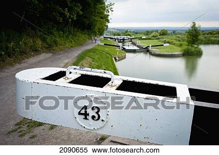 Stock Photography - Lock 43 Over The Kennet And Avon Canal In Caen Hill, Near Devizes, Wiltshire, Uk. Fotosearch