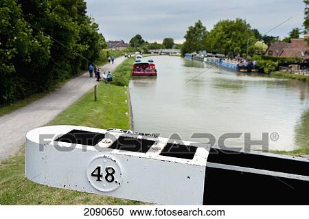 Stock Image - Lock 48 Over The Kennet And Avon Canal In Caen Hill, Near Devizes, Wiltshire, Uk. Fotosearch