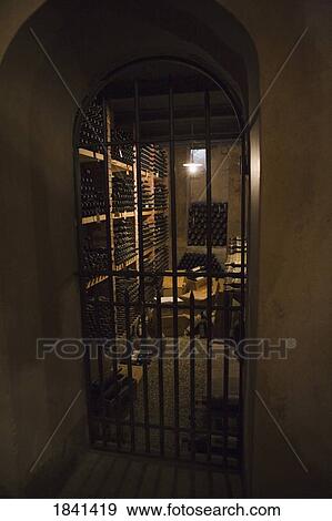 Locked Wine Cellar; Castello Di Verrazzano, Greti, Italy View Large Photo Image Stock Photo - Locked Wine Cellar; Castello Di Verrazzano, Greti, Italy. Fotosearch