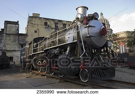Stock Image - Locomotive Restoration Workshop Restored Engine Sits In Yard; Havana, Artemisa, Cuba. Fotosearch