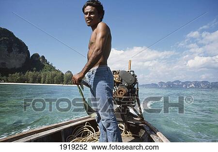 Stock Image - Londtail Boat. Fotosearch