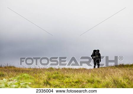 Picture - Lone Walker Hiking In Western Lake District; Cumbria, England, Uk. Fotosearch