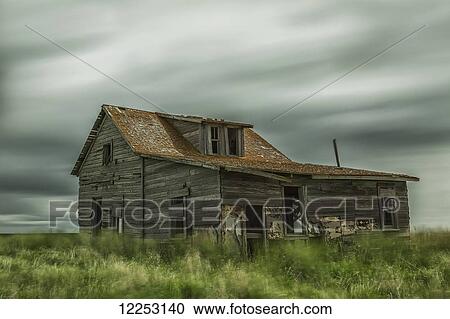 Long exposure of clouds going over an abandoned house; Val Marie, Saskatchewan, Canada View Large Photo Image Stock Image - Long exposure of clouds going over an abandoned house; Val Marie, Saskatchewan, Canada. Fotosearch