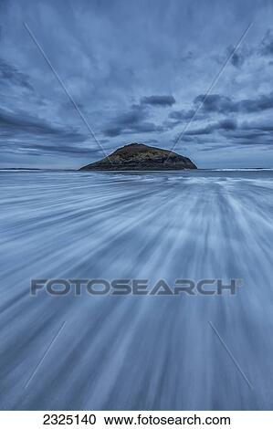 Stock Image - Long Exposure Of Water Flowing At Long Beach In Pacific Rim National Park; Vancouver Island British Columbia Canada. Fotosearch