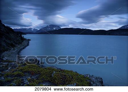 Long Exposure View Of Atlin Lake At Sunset, Atlin Provincial Park, British Columbia. View Large Photo Image Picture - Long Exposure View Of Atlin Lake At Sunset, Atlin Provincial Park, British Columbia.. Fotosearch