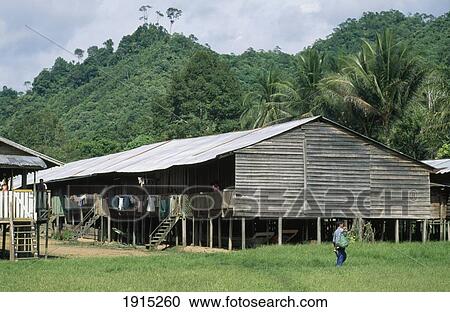 Stock Image - Long Houses Of Kenyh Tribe. Fotosearch