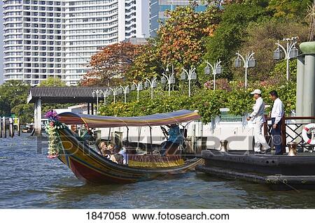 Long-Tail Boat On Mae Nam Chao Phray River; Bangkok, Thailand View Large Photo Image Stock Photo - Long-Tail Boat On Mae Nam Chao Phray River; Bangkok, Thailand. Fotosearch