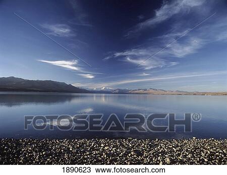 Looking Across Lake Pukaki In Early Evening To Mt. Cook And Southern Alps View Large Photo Image Stock Image - Looking Across Lake Pukaki In Early Evening To Mt. Cook And Southern Alps. Fotosearch