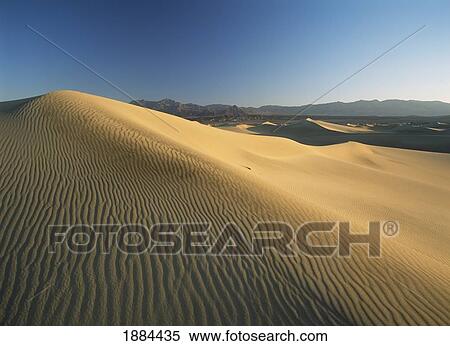 Stock Photography - Looking Across Sand Dunes At Dawn Near Stovepipe Wells. Fotosearch