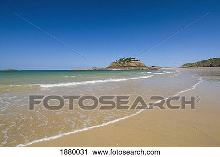 Stock Image - Looking Along Beach To The Fort Du Guesclin. Fotosearch