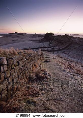 Looking Along Hadrian's Wall Shortly Before Dawn, At Cuddy's Crags Near Housesteads, Northumberland, England. View Large Photo Image Picture - Looking Along Hadrian's Wall Shortly Before Dawn, At Cuddy's Crags Near Housesteads, Northumberland, England.. Fotosearch