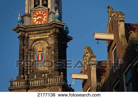 Stock Photo - Looking Along Street Of Gabled Houses To Oude Lutherse Kerk (Church) At Dusk, Amsterdam, Holland.. Fotosearch