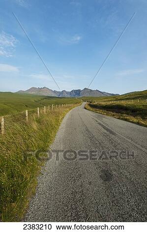 Looking along the road between Carbost and Glen Brittle towards the Black Cuillin; Isle of Skye, Scotland View Large Photo Image Stock Image - Looking along the road between Carbost and Glen Brittle towards the Black Cuillin; Isle of Skye, Scotland. Fotosearch