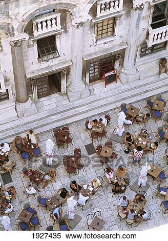 Looking Down From Campanile Of Cathedral Of St. Domnius, Part Of Diocletian's Palace To People In Cafe, Split; Split, Split-Dalmatia County, Croatia View Large Photo Image Stock Photography - Looking Down From Campanile Of Cathedral Of St. Domnius, Part Of Diocletian's Palace To People In Cafe, Split; Split, Split-Dalmatia County, Croatia. Fotosearch