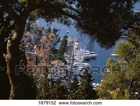 Stock Image - Looking Down From The Citadel To The Harbor Front And Town Of Hvar. Fotosearch