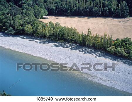 Stock Photo - Looking Down On Field Beside The Rakaia River. Fotosearch