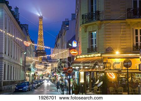 Looking Down Rue St Dominique At Dusk Towards The Eiffel Tower, Paris, France View Large Photo Image Stock Image - Looking Down Rue St Dominique At Dusk Towards The Eiffel Tower, Paris, France. Fotosearch