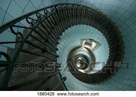 Stock Photo - Looking Down The Spiral Staircase Of The Lighthouse. Fotosearch
