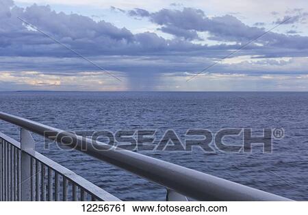 Stock Image - Looking out over the water from a BC Ferry; British Columbia, Canada. Fotosearch