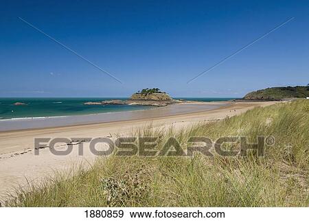Stock Photo - Looking Over Dunes And Along Beach To The Fort Du Guesclin. Fotosearch