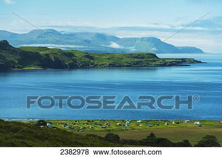 Looking over the Glen Brittle campsite with the Isle of Rum in the background; Isle of Skye, Scotland View Large Photo Image Stock Photo - Looking over the Glen Brittle campsite with the Isle of Rum in the background; Isle of Skye, Scotland. Fotosearch
