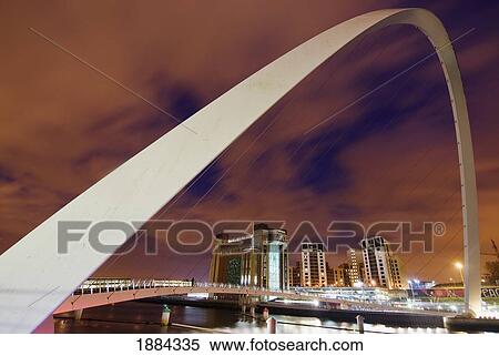Stock Photography - Looking Over The Tyne At Dusk Through The Winking Bridge To The Baltic Arts Centre. Fotosearch