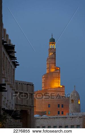 Looking over the Wafi souk to Qatar Islamic Culture Center and Mosque (Fanar) at dusk; Doha, Qatar View Large Photo Image Stock Photography - Looking over the Wafi souk to Qatar Islamic Culture Center and Mosque (Fanar) at dusk; Doha, Qatar. Fotosearch