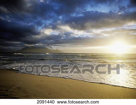 Looking Over To Cape Town And Table Mountain At Dusk From Blouberg Beach, South Africa. View Large Photo Image Stock Image - Looking Over To Cape Town And Table Mountain At Dusk From Blouberg Beach, South Africa.. Fotosearch