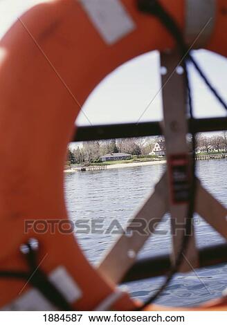 Stock Photo - Looking Through A Buoy On A Ferry Towards Land. Fotosearch