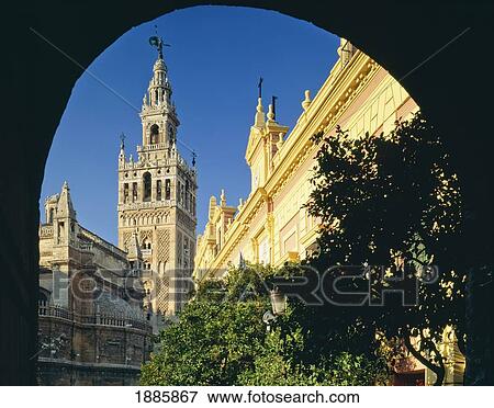 Stock Photo - Looking Through Archway To Tower, Giralda. Fotosearch