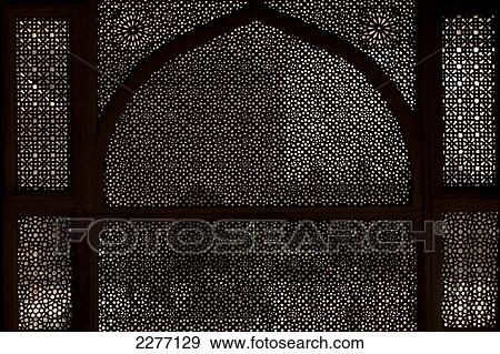 Looking through stone lattice wall in the Jami Masjid; Fatehpur Sikri, Agra, India View Large Photo Image Stock Photo - Looking through stone lattice wall in the Jami Masjid; Fatehpur Sikri, Agra, India. Fotosearch