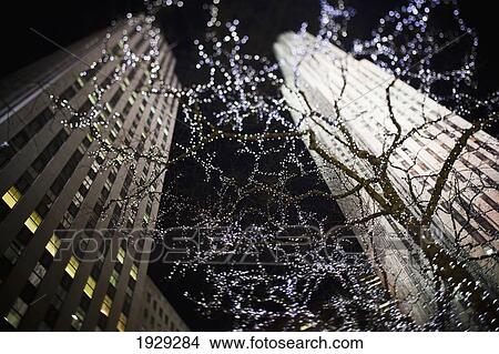 Looking up at the Rockefeller building at night; New York City, New York, United States of America View Large Photo Image Picture - Looking up at the Rockefeller building at night; New York City, New York, United States of America. Fotosearch