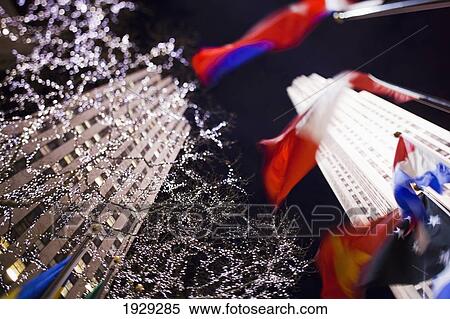 Looking up at the Rockefeller building at night; New York City, New York, United States of America View Large Photo Image Stock Photography - Looking up at the Rockefeller building at night; New York City, New York, United States of America. Fotosearch