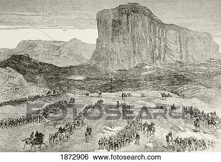 Stock Photograph - Lord Chelmsford's Column Arrives At Isandlwana, Kwazulu-Natal Province, South Africa. From Afrika, Dets Opdagelse, Erobring Og Kolonisation, Published In Copenhagen, 1901.. Fotosearch