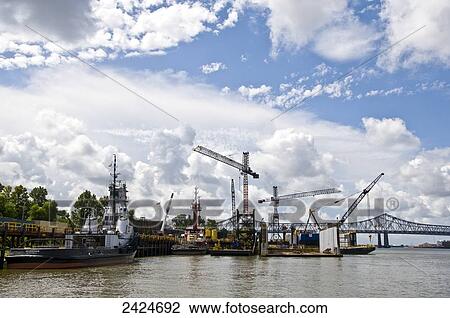Stock Image - Louisiana, New Orleans, COnstruction along the coastline.. Fotosearch