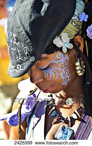 Louisiana, New Orleans, Local girl at festival with facepaint. View Large Photo Image Stock Photo - Louisiana, New Orleans, Local girl at festival with facepaint.. Fotosearch