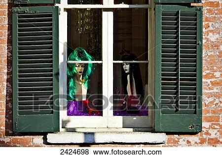 Stock Photo - Louisiana, New Orleans, Mannequins in storefront window.. Fotosearch