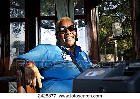 Louisiana, New Orleans, Portrait of a streetcar operator View Large Photo Image Stock Photo - Louisiana, New Orleans, Portrait of a streetcar operator. Fotosearch