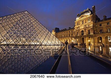 Louvre Pyramid By The Architect I. M. Pei And Richelieu Wing Of The Louvre Museum At Night, Paris, France View Large Photo Image Stock Image - Louvre Pyramid By The Architect I. M. Pei And Richelieu Wing Of The Louvre Museum At Night, Paris, France. Fotosearch