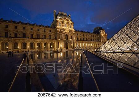 Louvre Pyramid By The Architect I. M. Pei And Denon Wing Of The Louvre Museum At Night, Paris, France View Large Photo Image Stock Image - Louvre Pyramid By The Architect I. M. Pei And Denon Wing Of The Louvre Museum At Night, Paris, France. Fotosearch